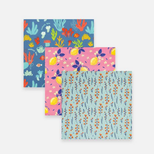 Blue coral, pink lemon and sky blue wildflower beeswax wraps.