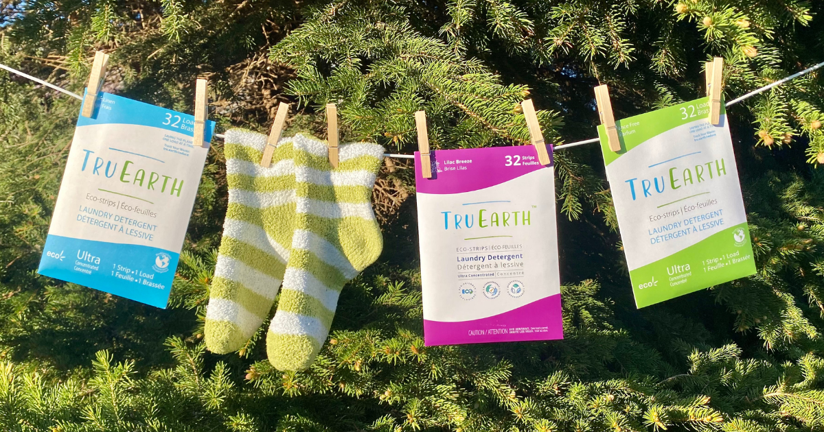 Shop Dire clothes line with Tru Earth Fresh Linen, Fragrance Free and Lilac Breeze laundry detergent handing on it.