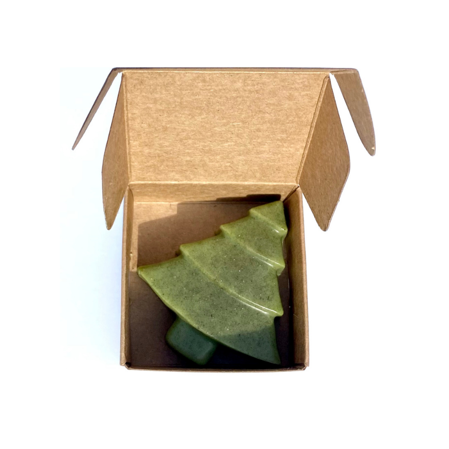 Overview of open box containing Diphy Wellness evergreen soap bar.