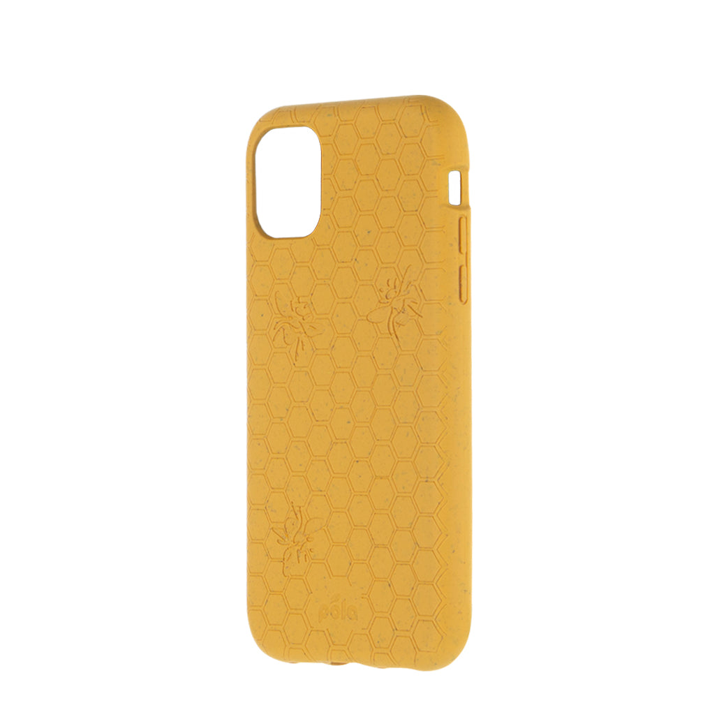 Right sideview of honey bee, honeycomb engraved Pela phone case for the iPhone 11.