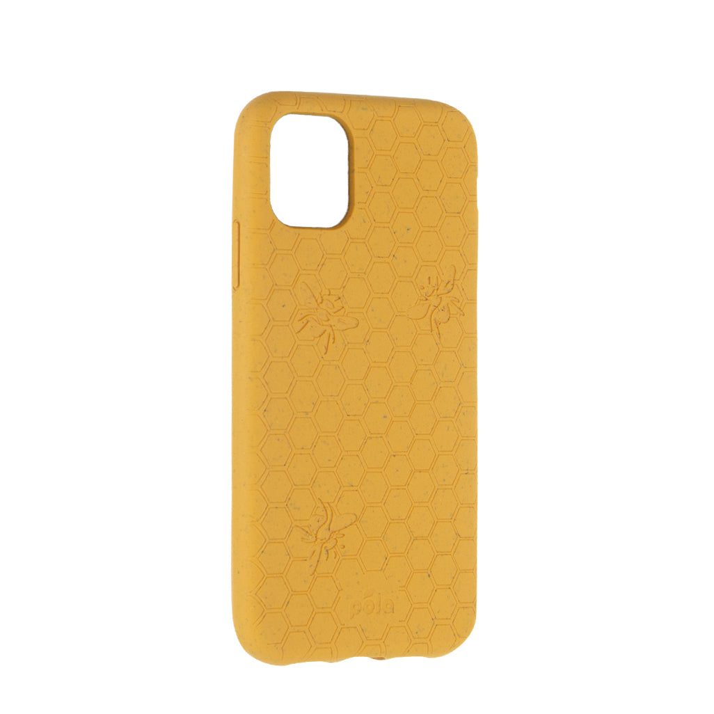 Left sideview of honey bee, honeycomb engraved Pela phone case for the iPhone 11.