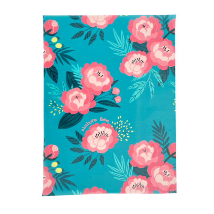 Jumbo blue beeswax wrap with pink tropical flowers.