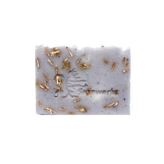 Lavender Georgian Bay Soapworks bar soap with visible ground oatmeal.